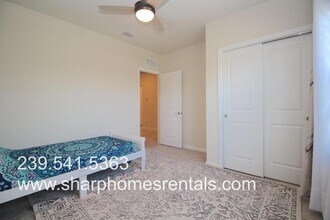16008 Beachberry Dr in North Fort Myers, FL - Building Photo - Building Photo