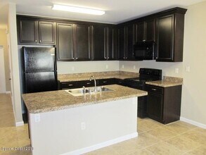 1385 Lara Cir in Rockledge, FL - Building Photo - Building Photo