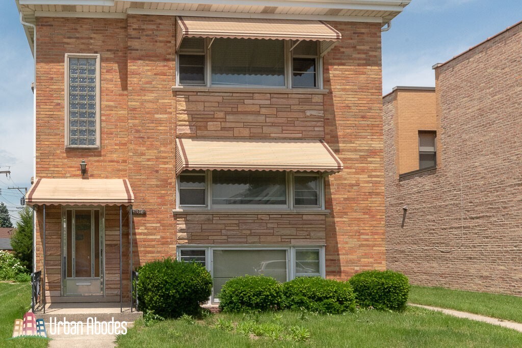 6408 W Raven St, Unit J03P in Chicago, IL - Building Photo