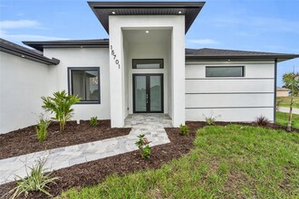 15701 Lakeland Cir in Port Charlotte, FL - Building Photo - Building Photo