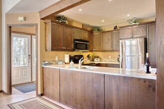 1691 Chem. du Golf in Mont-tremblant, QC - Building Photo - Building Photo