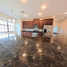 3772 Pino Vista Way, Unit 4 in Estero, FL - Building Photo - Building Photo