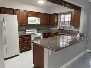 12162 SW 51st Pl in Cooper City, FL - Building Photo - Building Photo