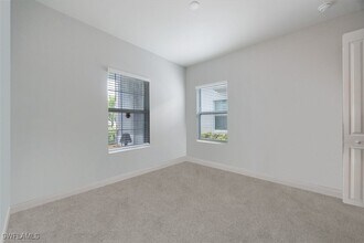 2401 Ariane Dr in Naples, FL - Building Photo - Building Photo