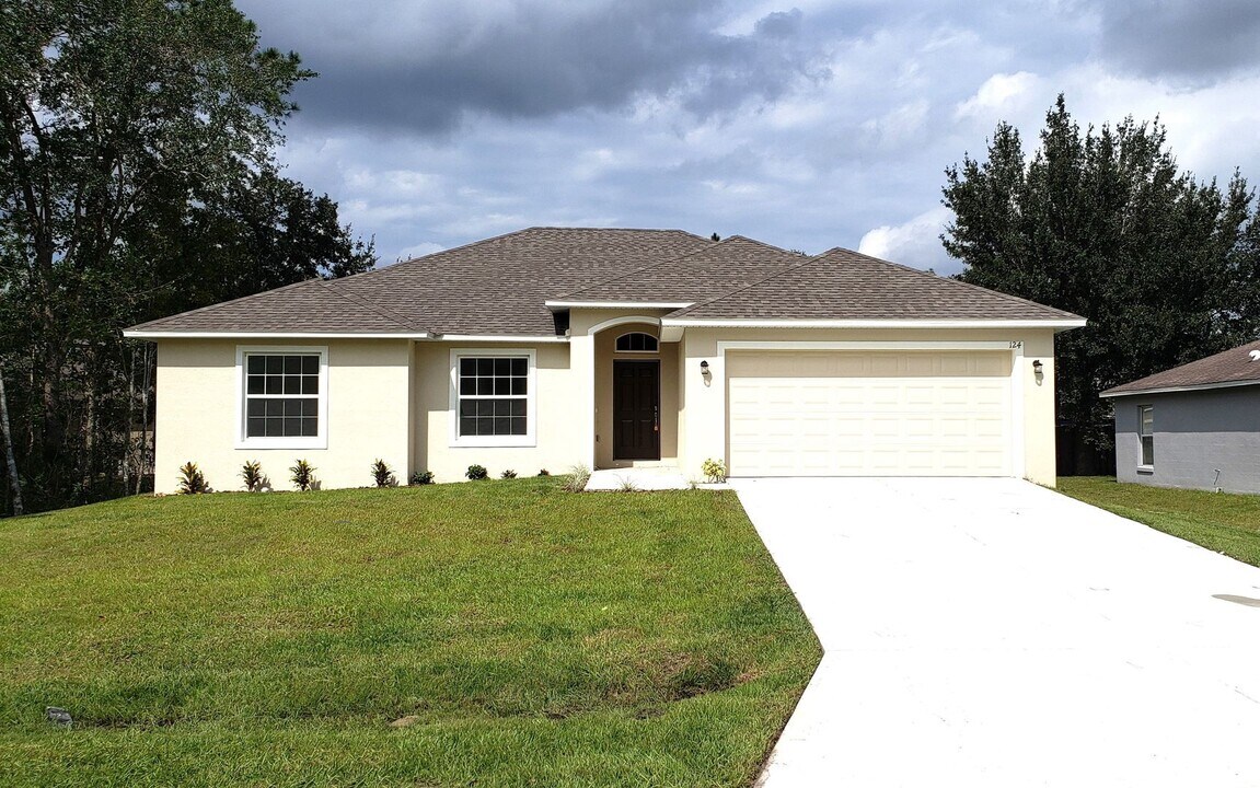 124 Spoonbill Ct in Poinciana, FL - Building Photo