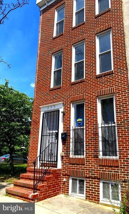 335 N Stricker St in Baltimore, MD - Building Photo