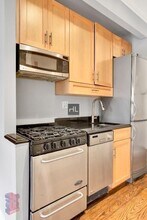 E 13TH ST., Unit 4E in New York, NY - Building Photo - Building Photo