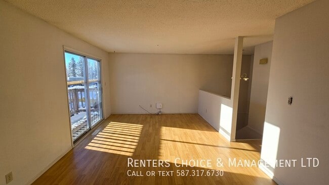 3 Bedroom Unit With Assigned Parking in Hanna, AB - Building Photo - Building Photo