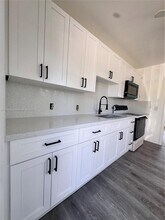 1035 Atlantic Ave in Opa Locka, FL - Building Photo - Building Photo