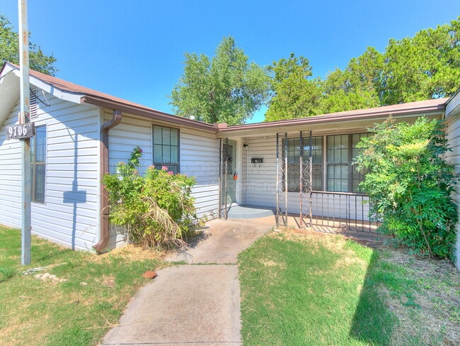 property at 9706 N Garnett Dr