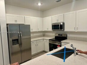 4343 Hammock Grove Dr in Greenacres, FL - Building Photo - Building Photo