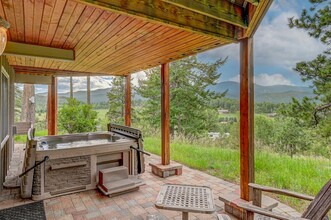 8760 S Grizzly Way in Evergreen, CO - Building Photo - Building Photo