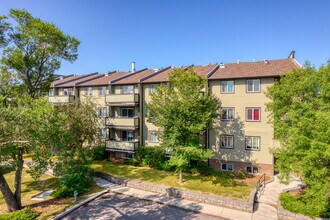 Woodside Village in Calgary, AB - Building Photo - Building Photo