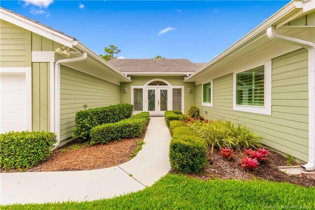 property at 12813 NW Cinnamon Way