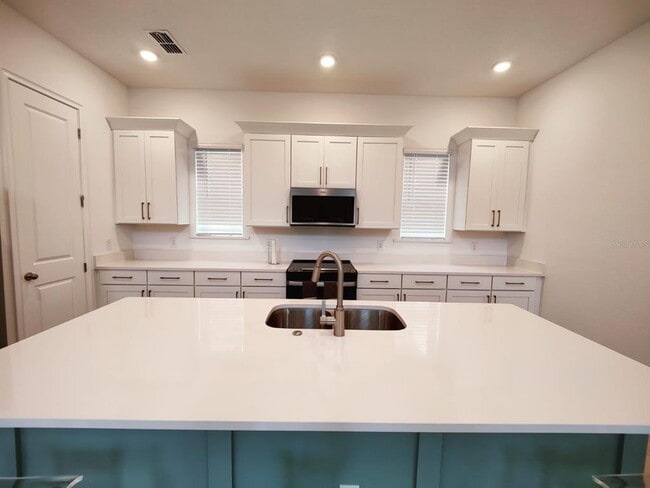 7703 Nemours Pkwy in Orlando, FL - Building Photo - Building Photo