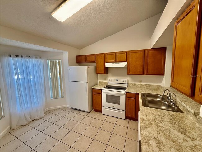 1128 Jade E Ln in Kissimmee, FL - Building Photo - Building Photo