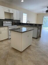 1640 Carriage Brooke Dr in Wellington, FL - Building Photo - Building Photo