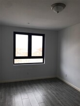 7302 Woodside Ave in Queens, NY - Building Photo - Building Photo