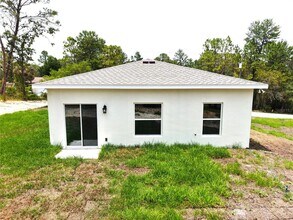 8990 Glenarm Way in Spring Hill, FL - Building Photo - Building Photo