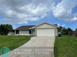 4057 SW Haycroft St in Port St. Lucie, FL - Building Photo - Building Photo