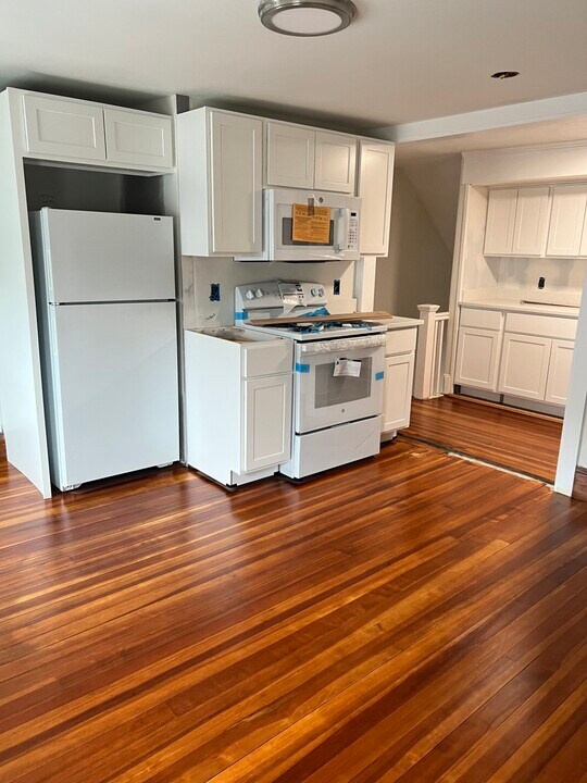 48 Powder House Blvd, Unit 13 in Somerville, MA - Building Photo