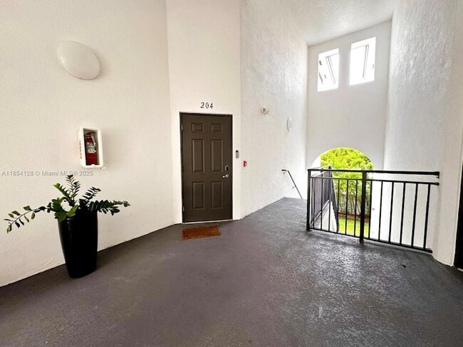 15540 SW 136th St, Unit 204 in Miami, FL - Building Photo - Building Photo
