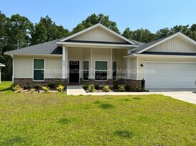 6937 Trail Ride S in Milton, FL - Building Photo