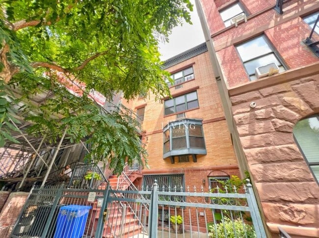 property at 233 W 121st St