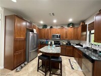 1135 Medan Ct N in Naples, FL - Building Photo - Building Photo