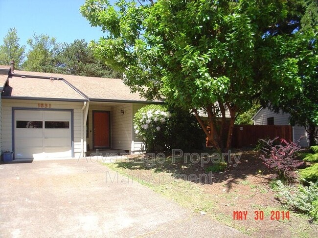 property at 1831 NW Grant Cir
