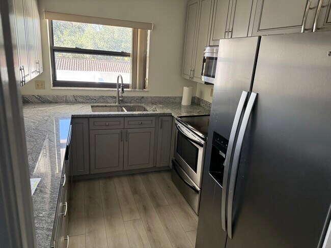 6021 SE Landing Way in Stuart, FL - Foto de edificio - Building Photo