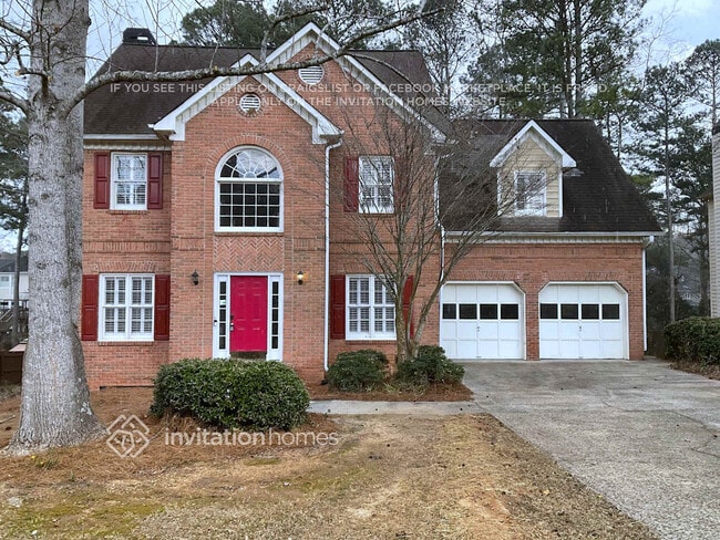 property at 6309 Woodlore Dr NW