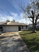 991 Flomich St in Holly Hill, FL - Foto de edificio - Building Photo