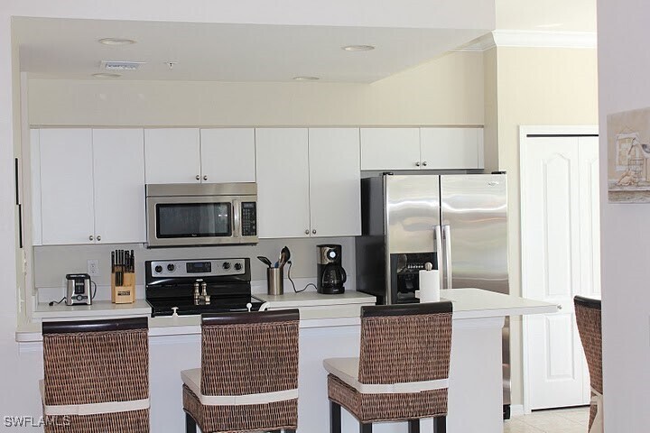 8680 Cedar Hammock Cir in Naples, FL - Building Photo