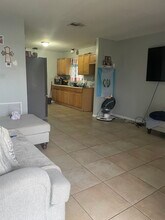 213 10th St NW, Unit 213-A in Moore Haven, FL - Foto de edificio - Building Photo