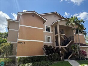 9033 Wiles Rd in Coral Springs, FL - Building Photo - Building Photo
