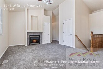 1464 W Duck Pond Ln in Taylorsville, UT - Building Photo - Building Photo