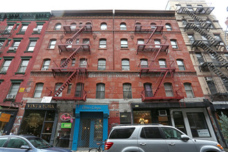 247-251 Elizabeth St in New York, NY - Building Photo - Building Photo