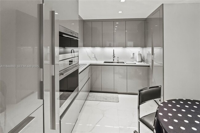 property at 8877 Collins Ave