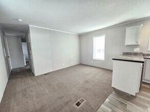 107 Beech in Highland, MI - Building Photo - Building Photo