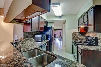 124 Cypress Way E in Naples, FL - Building Photo - Building Photo