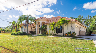 5892 NW Canada St in Port St. Lucie, FL - Foto de edificio - Building Photo