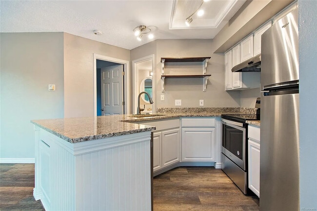 5250 S Huron Way, Unit 1-204 in Littleton, CO - Building Photo - Building Photo