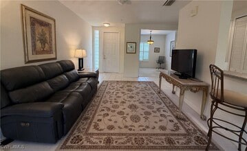 1335 Sweetwater Cove in Naples, FL - Building Photo - Building Photo