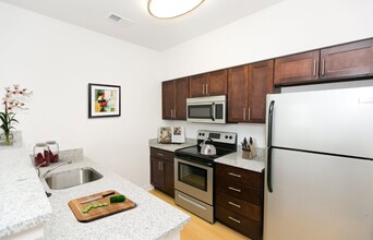 The Townes at Mill Run Apartments in Owings Mills, MD - Building Photo - Building Photo