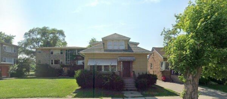 13934 S Edbrooke Ave in Riverdale, IL - Building Photo