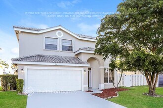 7442 Michigan Isle Rd in Greenacres, FL - Building Photo - Building Photo