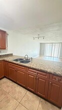 6980 NW 186th St, Unit 3-126 in Hialeah, FL - Building Photo - Building Photo