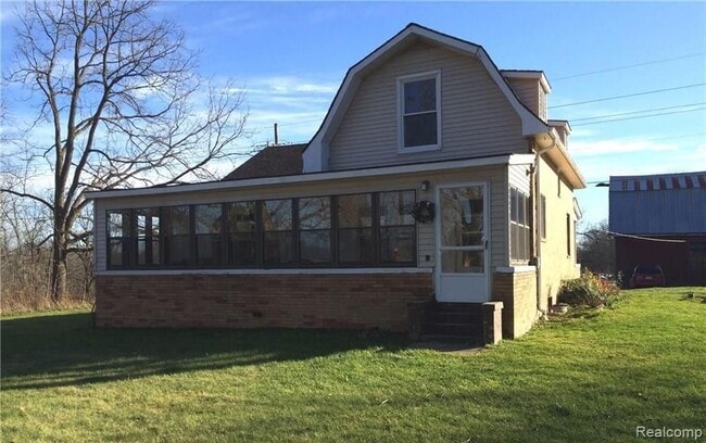 property at 12175 Rattalee Lake Rd
