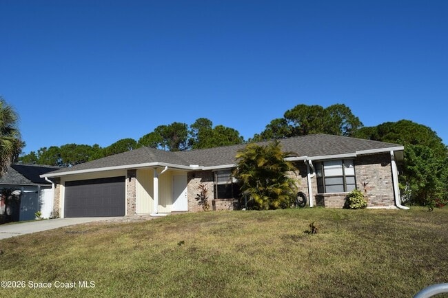 1501 Jacobin St NW in Palm Bay, FL - Foto de edificio - Building Photo